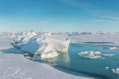 Melting ice at North Pole, Arctic - Stock Photo - Dissolve