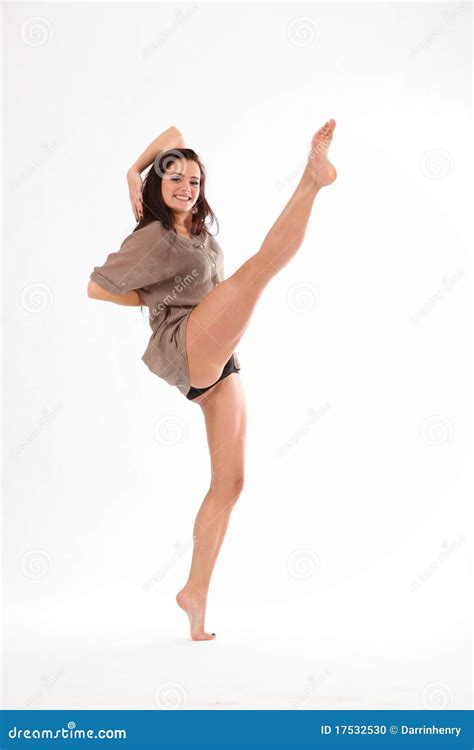 High Kick Dance By Happy Young Woman In Studio Stock Photo - Image: 17532530