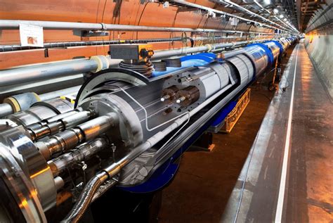 View of the LHC tunnel with an artistic cut through a LHC dipole... | Download Scientific Diagram