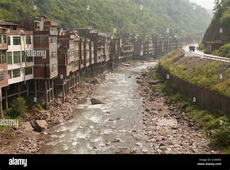 Stilt house along the stream, Yanjin, Zhaotong, Yunnan , China Stock Photo - Alamy