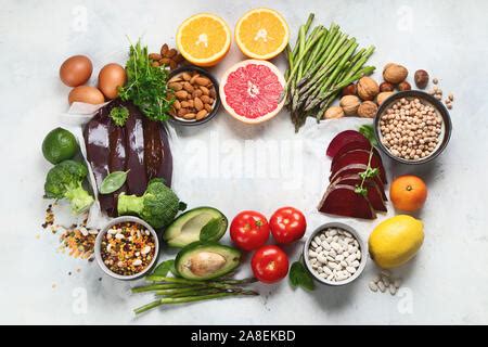 Foods high in vitamin B9. Healthy food, sources of folic acid. Top view Stock Photo - Alamy