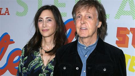 Paul McCartney and wife Nancy Shevell look so in love as they cuddle up ...