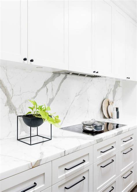 Black & white kitchen by Biasol: Design Studio. Photo by Daniel Aulsebrook. White Kitchen Marble ...