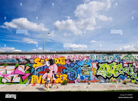 Berlin wall view; Graffiti on original section of Berlin Wall at East ...