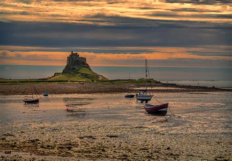 The Castle Holy Island Photograph by Trevor Kersley