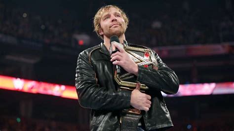 Dean Ambrose celebrates his WWE World Heavyweight Championship victory ...