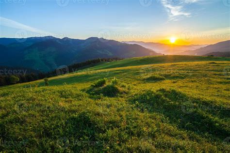 Beautiful summer sunrise in mountains. 1322728 Stock Photo at Vecteezy