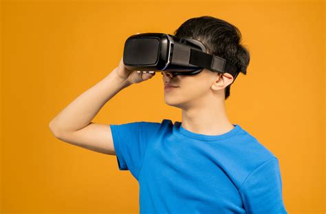 Man Putting on a VR Headset · Free Stock Photo