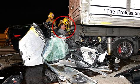 Driver is millimetres away from decapitation after ducking as he crashes his Corvette underneath ...