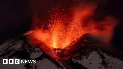 Mount Etna: Volcano sprays lava into Sicily's night sky