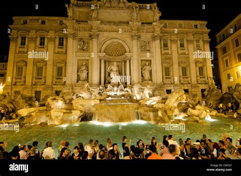 Trevi Fountain, Rome, Italy tourists at night Stock Photo - Alamy