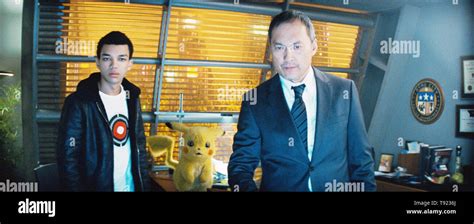 POKEMON DETECTIVE PIKACHU, from left: Justice Smith, Detective Pikachu (voice: Ryan Reynolds ...