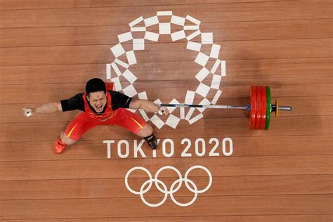 Photos of Olympic athletes breaking world records at Tokyo Games