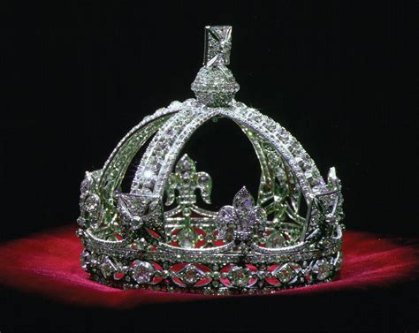 The crown of Queen Victoria, who ruled the United Kingdom from 1837 to 1901, is filled with ...