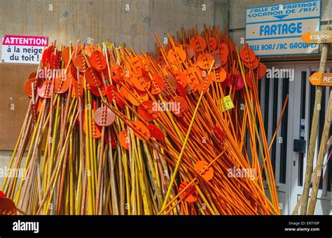 Brightly colored coloured skiing equipment in storage Stock Photo - Alamy