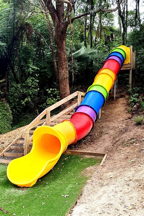 Rainbow Tube Slide | Playground slide, Slide, Kids playground