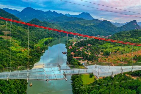 World's longest glass-bottomed bridge opens in China | Scenic, Tourism ...