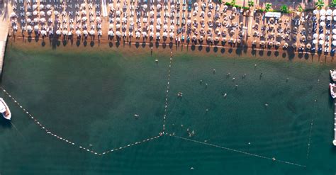 Aerial Shot of a Tourist Resort and Beach · Free Stock Photo