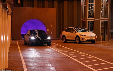 Elon Musk's $55m mile-long tunnel Loop at Las Vegas convention center is unveiled as public ...