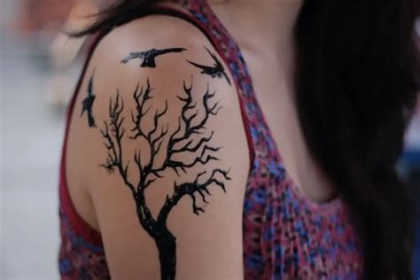 Crow Tattoo Meaning - Inkspired Magazine