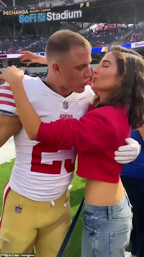 Olivia Culpo gives NFL star Christian McCaffrey congratulatory kiss ...