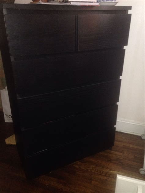 Ikea black dresser with six drawers, approx 4 ft high, 19" deep, 32 ...