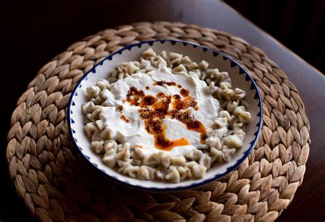 Manti, Turkish Ravioli with Yogurt and Hot Butter Sauce Stock Photo ...