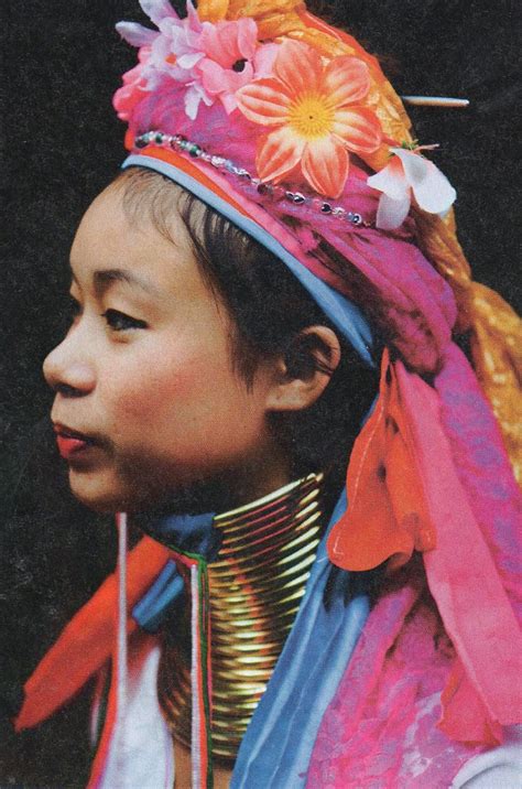 A women of Padaung tribe wearing the traditional brass rings that help ...