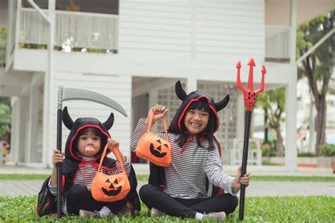 Premium Photo | Children in costumes going to trick or treat