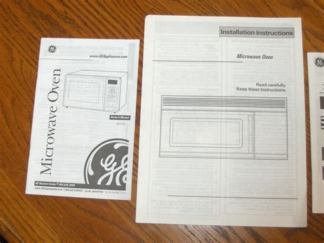 GE Spacemaker XL Microwave Oven Owners Manual JES1231 Installation Instructions - Books & Magazines