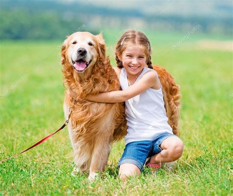 Little girl with golden retriever Stock Photo by ©GekaSkr 54580621