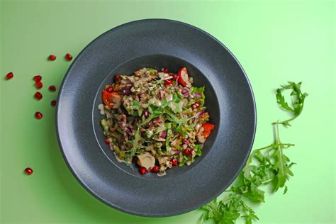 Fresh Salad with Pomegranate Seeds in a Bowl · Free Stock Photo