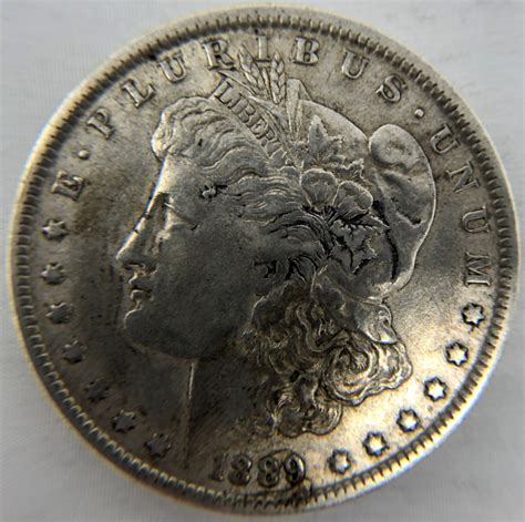 1889-O Morgan Silver Dollar | Pristine Auction