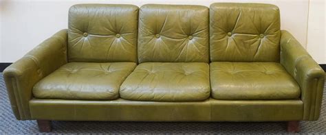 Lot - Mid-Century Modern Green Leather Upholstered Sofa, L: 77 in. (195.6 cm.)