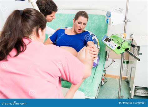 Woman Giving Birth In Labor Room Of Hospital Royalty-Free Stock Photography | CartoonDealer.com ...