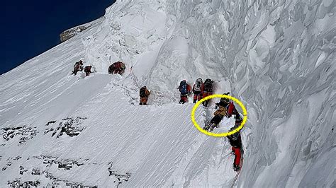 He dies on K2, the other climbers climb over him to reach the summit. - YouTube