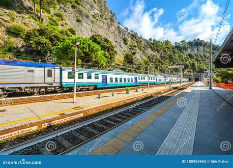 A Train Travels through the Monterosso Al Mare Train Station on the ...