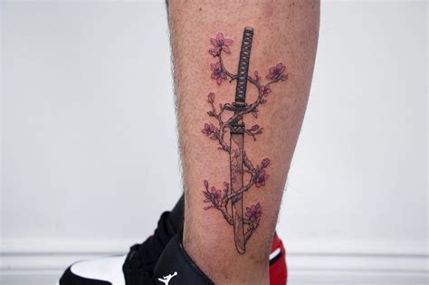 cherry blossom katana tattoo - Google Search in 2020 | Sakura tattoo, Sword tattoo, Blossom tattoo