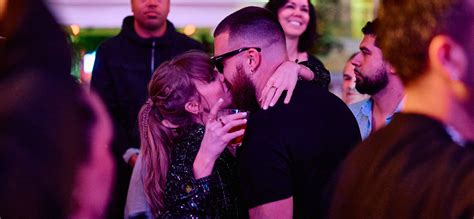 Travis Kelce ‘Protective’ Of ‘Glowing’ Taylor Swift At L.A. Party ...