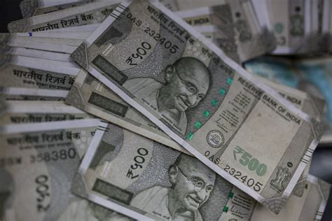 India Rupee's Drop Versus the Dollar Exaggerates Its Global Role ...