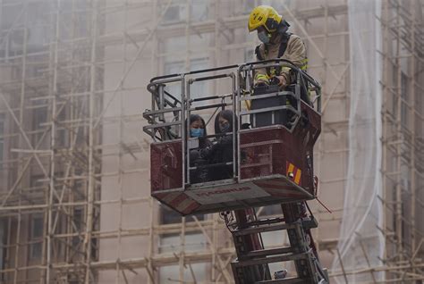 Hundreds Rescued from Hong Kong Tower Rooftop After Fire Breaks Out ...