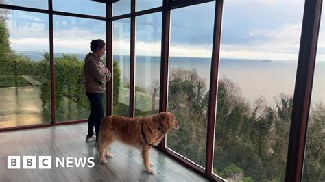 Watch: Isle of Wight resident losing her home to a landslip - BBC News