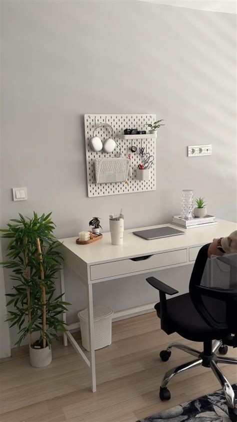 White Desk Makeover with Black Chair and Potted Plant