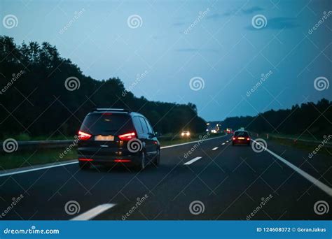 Traffic on the Highway at Sunset Stock Photo - Image of auto, asphalt ...