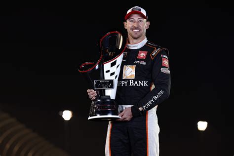 Portraits of a champion: 2021 title winners with their trophies | NASCAR