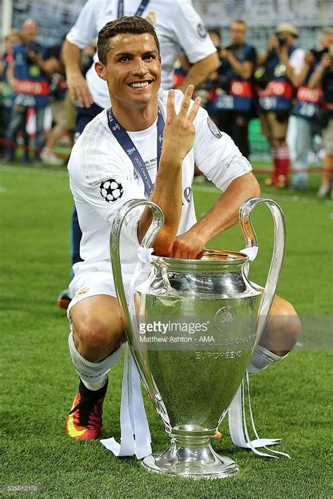 Cristiano Ronaldo of Real Madrid celebrates with the trophy following ...