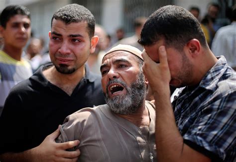 The Conflict in Gaza Enters a 14th Day - The New York Times