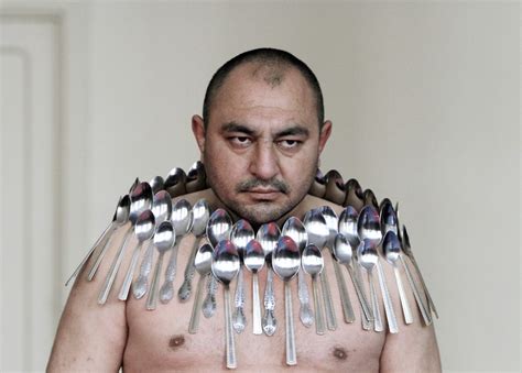 Most spoons balanced on a human body: Etibar Elchyev sets world record (Video)