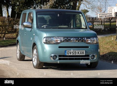 2010 Nissan Cube, boxy Japanese cult compact car with unusual asmmetrical rear door Stock Photo ...