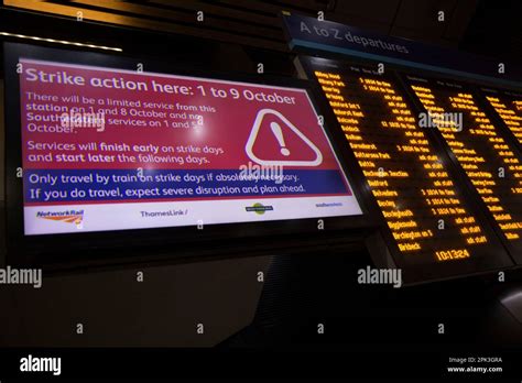 An electric timetable is seen at London Bridge railway station in ...